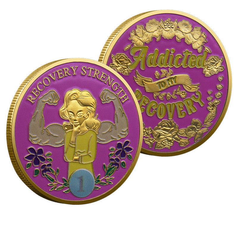 Recovery Strength Addicted to My Recovery Challenge Coin both sides display – obverse flexing woman Year 1 and reverse Addicted to My Recovery floral gold-tone purple enamel